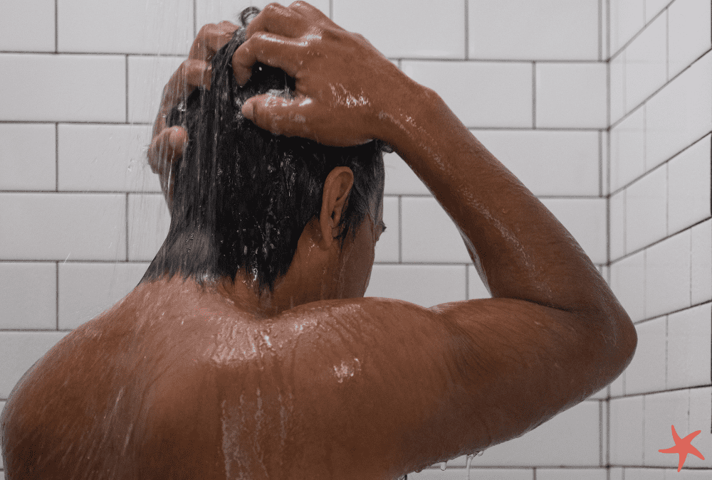 Man Washing Hair with Plaine Products